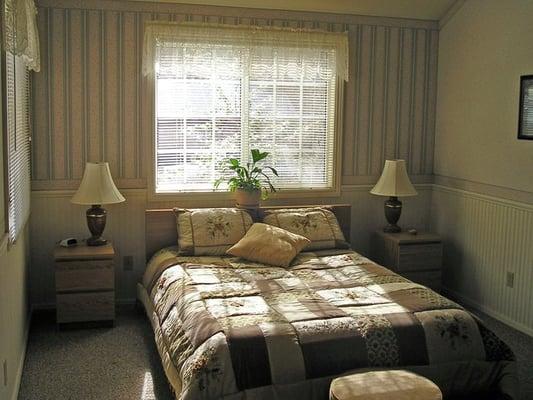 Large bedroom with tempurpedic mattress.