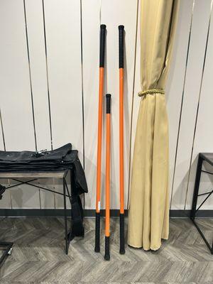 Mobility sticks used to train and stretch.