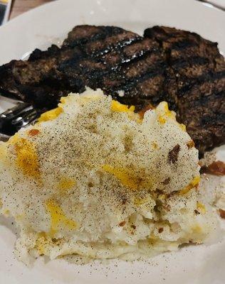 Steak and loaded mash potatoes
