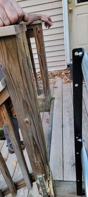 The ramp railing is not connected to the deck.