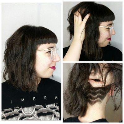 Textured bob with blunt bangs and undercut design