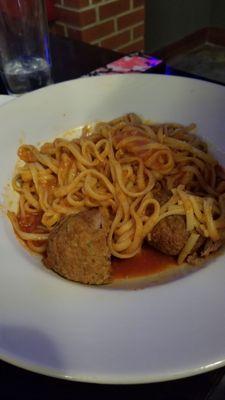 Watery sauce and processed meat... more like Chef Boyardee meatballs.