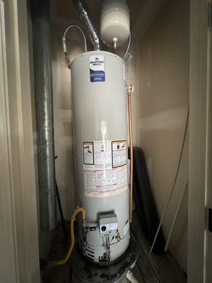 New hot water heater with overflow and fittings