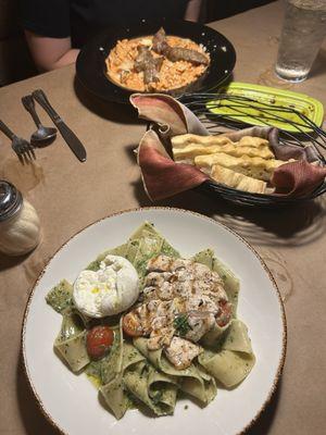 Vodka sauce, homemade bread, and pesto with chicken