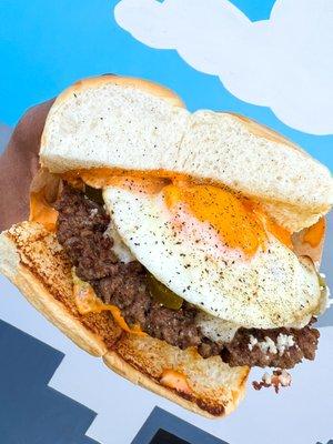 CHIPOTLE AVOCADO BURGER - impossible patty, white american cheese, avocado, pickled jalapeños, cotija cheese, fried egg, chipotle aioli