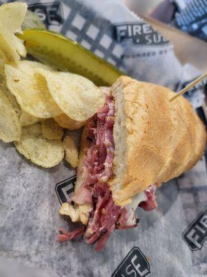 Half of my Medium New York Steamer (pastrami, provolone, mustard). Really good.