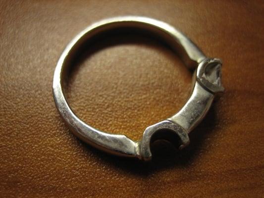 Less than a year into wearing this, the band BROKE and later the diamond fell out. Great job. Dynasty Diamonds.