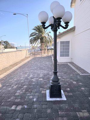 New pavers and tree removal and added rock to the left and right