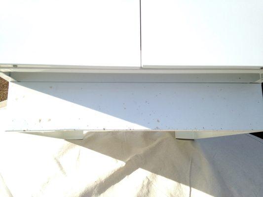 dirt on the bottom of cabinet