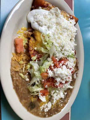 3 enchilada plate. Cheese, shredded beef, and chicken enchiladas. Beans and rice. American/Mexican cheeses.