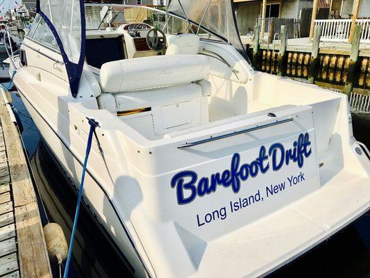 We installed vinyl lettering onto the back of a boat!