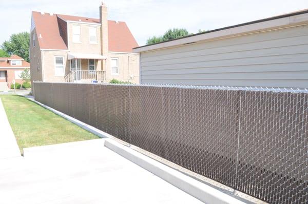 Galvanized Chian-link with Brown Pds (privacy strips)