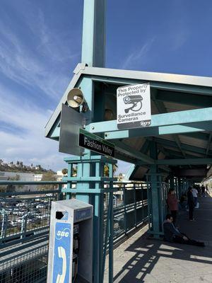 Surveillance cameras AND a pay phone!