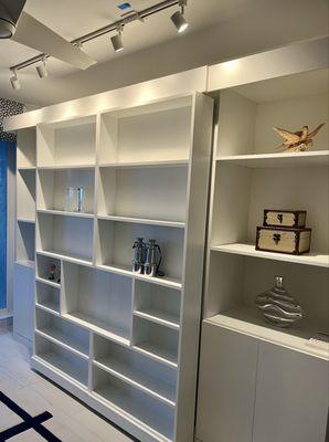 Murphy Bed with sliding shelves.
