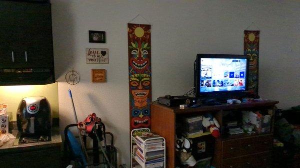 Decent size room. Includes kitchenette, TV, dresser, 2 beds, desk, vanity area with sink, and bathroom with full size tub.