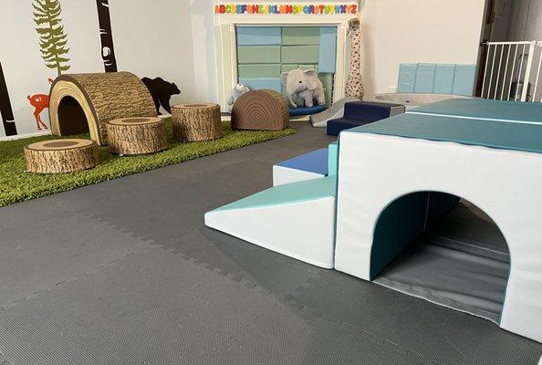 Our nature area (gross motor area)allows children to refine their motor skills by practicing balancing, physical strength, and coordination