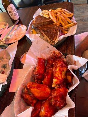 Chicken wings and Reuben sandwich