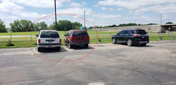 Abandoned cars with flat tires.