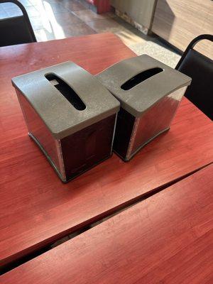 Dirty and Empty napkin holders, tables were dirty as well.