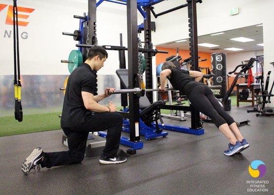 Personal trainer Josh working with a client.