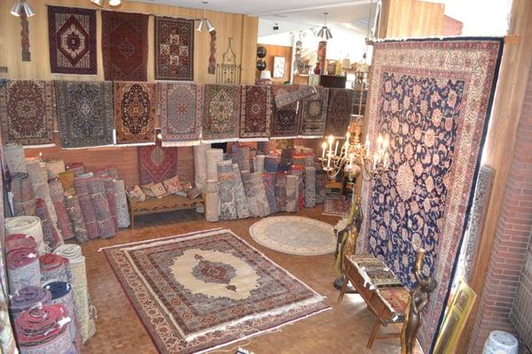 A vast collection of rugs & antiques.