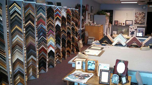 We have oodles of frame samples and mat combinations to choose from for your projects. Let the professionals help you at our design table.