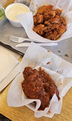 Suicidal tenders (NOT b/l wings, breaded tenderloins) & hot wings. W/ blue cheese because if you get ranch, your B-lo card gets pulled!