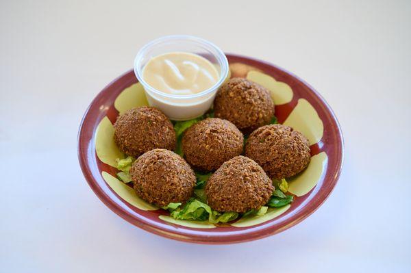 TRy our delicious falafel crafted from special recipe. Ensuring a perfect balance of crispiness and flavor in every bite, also veganfriendly