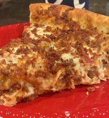 Slice of the Chicago Deep Dish Meaty.