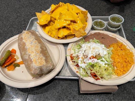 Chicken burrito, chicken enchiladas and cheese nachos