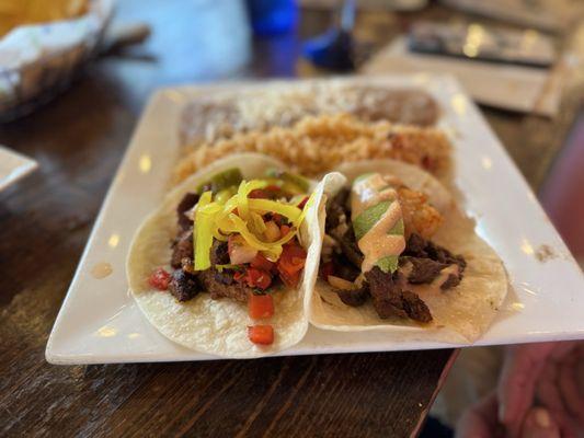 Al Pastor and Surf and Turf taco platter