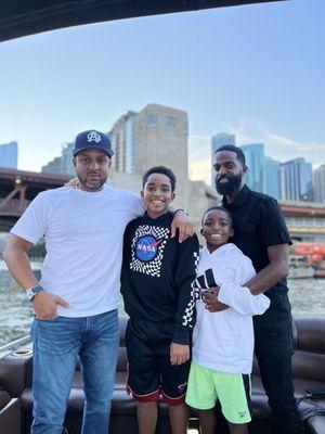 Just a couple of guys chilling on the boat ride.