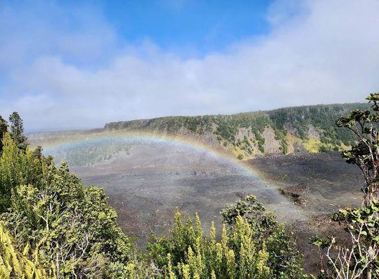 Devastation Trail ends near parking, bathroom, & scenic point at Puupuai Hill. View along mile-long, 400-foot-deep Kīlauea Iki mini-crater.