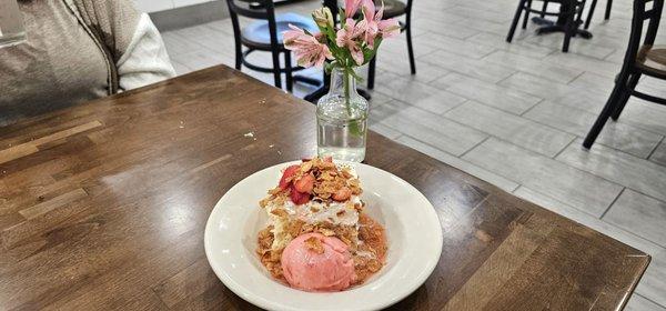 Cornbread Tres Leches with Sweet cream, macerated fresh strawberries, finished with Strawberry Gity Gelato