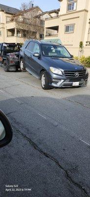 Mercedes truck being towed from Sycamore Bay apt