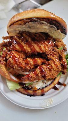 Softshell crab, roasted garlic aioli, unagi drizzle, lettuce, tomato & onion served on a brioche bun.