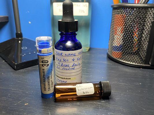 Mixing homeopathic remedies in a liquid form