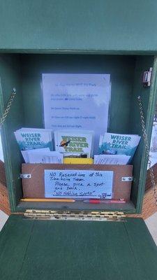 Campground payment envelopes and brochures for the Weiser River Trail.