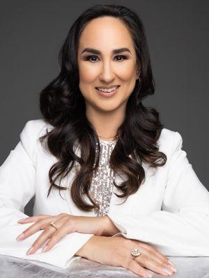 Zita De La Garza-RE/MAX Elite