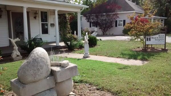 Stone & Wood Sculpture with a story 2901 Veach Rd, Owensboro,KY