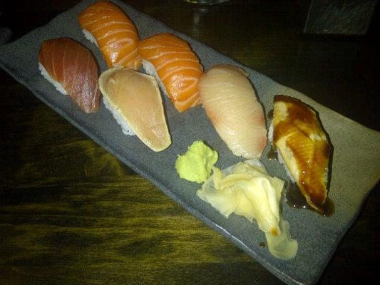 Assorted sushi: 2 Salmon, 1 Hamachi, 1 Sea Eel, 1 Albacore Tuna, 1 Big Eye Tuna, Wasabi and Ginger