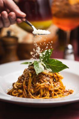 Spaghetti Bolognese: Classic Bolognese sauce, simmered to perfection and served over fresh