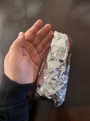 This is supposed to be a breakfast burrito with EVERYTHING! i have a small hand! Not worth it. Never going back