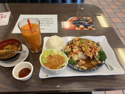 Mild cashew chicken lunch with steamed rice, and Thai tea.