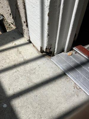 Chunk of doorframe missing.