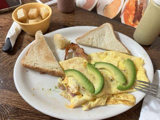 Omelette was decent. Avocado slices were super thin but very fresh. No butter or jelly with the bread.