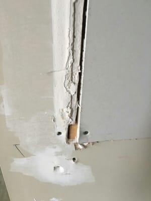 Big holes left in the wall after his terrible "work"
