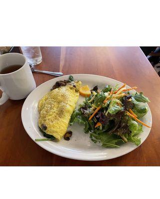Omelette. Tough stems. Nice salad. No bread.