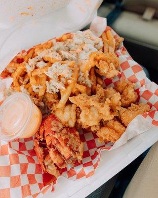 Fried jumbo shrimp, fried lobster and blue crabby fries
