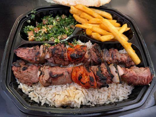 Beef kabob plate with fries and tabouli